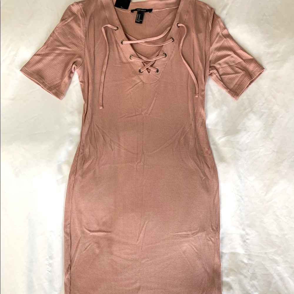 Pink lace-up bodycon dress